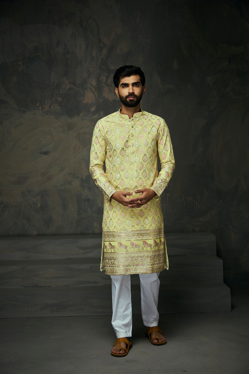 Light Yellow Georgette Heavy Work Kurta with Horse Motif  Borders